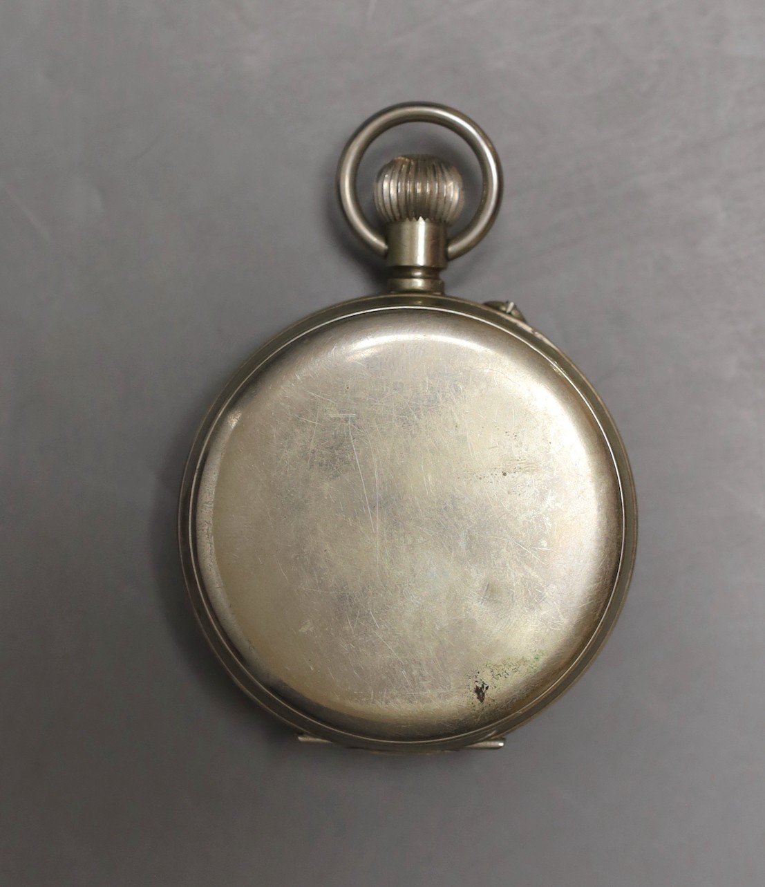 A George V silver and leather travelling watch case, Birmingham, 1917, 11.4cm, with nickel cased Goliath pocket watch.